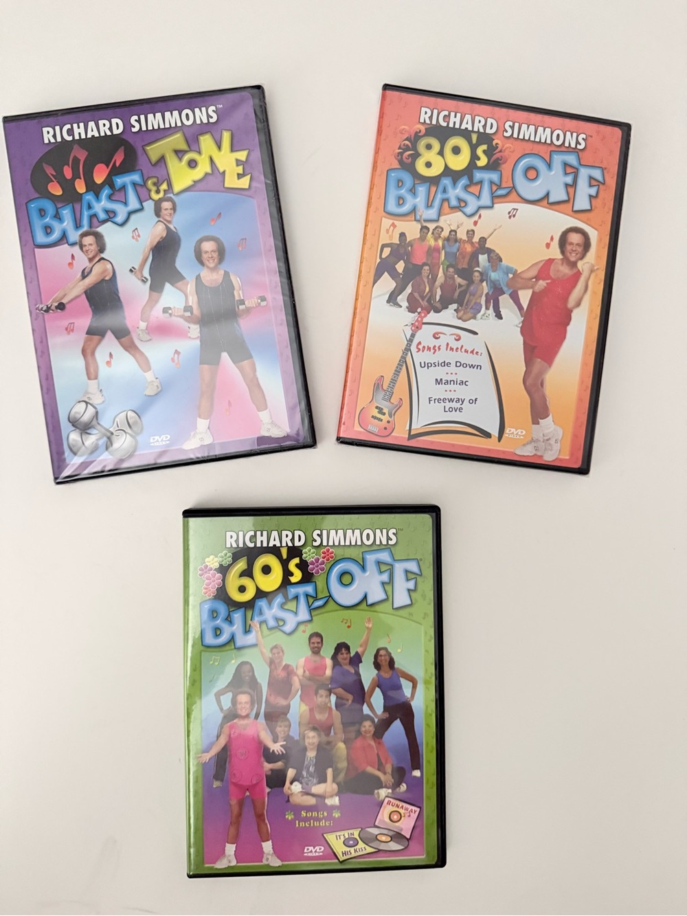 Richard Simmons workout discs- 3 separate discs-2 unopened and one opened